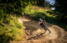 Man descending an ATV trail in summer